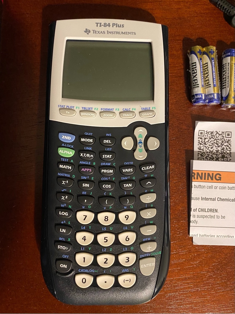 Texas Instruments TI-84 Plus Graphing Calculator Box - Black/Red